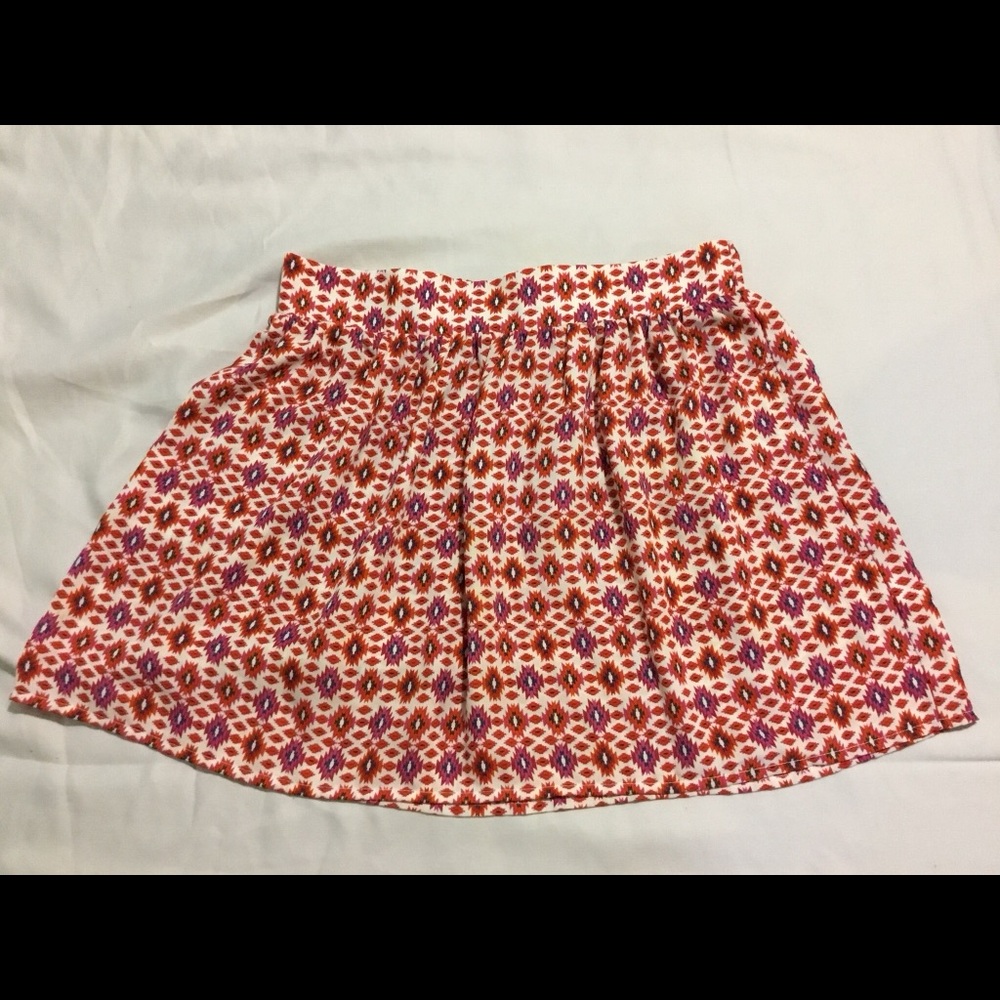 Red and white patterned skirt